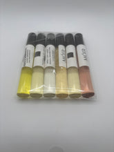 Cargar imagen en el visor de la galería, 6pack Body oil 1/3 ounce roll on Great value saver