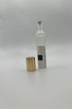 Load image into Gallery viewer, Champagne Toasty..Comes in a beautiful frosted (10ml) roll on bottle or a (30ml) size...Excellent to travel or refresh throughout the day.

