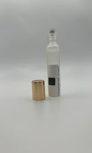 Load image into Gallery viewer, Champagne Toasty..Comes in a beautiful frosted (10ml) roll on bottle or a (30ml) size...Excellent to travel or refresh throughout the day.

