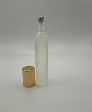 Load image into Gallery viewer, Champagne Toasty..Comes in a beautiful frosted (10ml) roll on bottle or a (30ml) size...Excellent to travel or refresh throughout the day.
